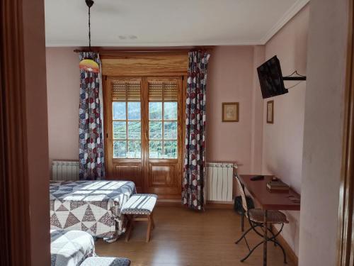 TV a/nebo společenská místnost v ubytování Hotel Pico Espiguete