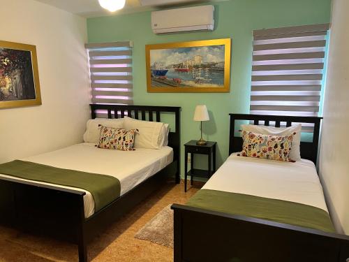 Postel nebo postele na pokoji v ubytování Suite Colonial by Cristi