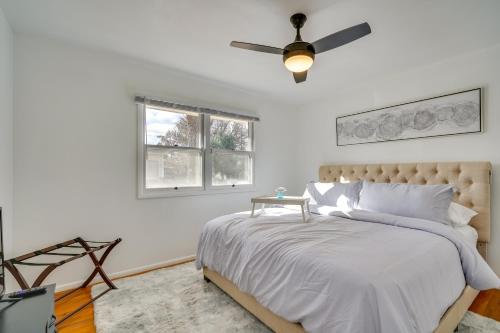 a bedroom with a bed and a ceiling fan at Chic Pueblo Vacation Rental Home Near Fairgrounds! in Pueblo