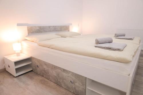 Ένα ή περισσότερα κρεβάτια σε δωμάτιο στο apartmán Argentum