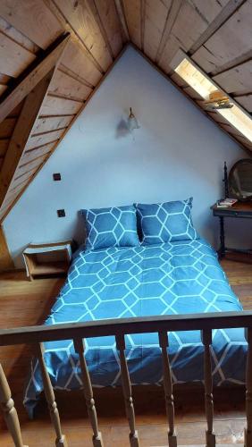 Postel nebo postele na pokoji v ubytování Beskidzka Apartments