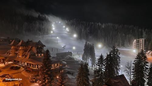 a ski resort at night with snow and lights at Sun&Snow Jahorina in Jahorina