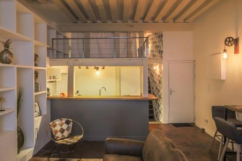 Photo de la galerie de l'établissement Le Marais - Charlot - Appartement de caractere, à Paris