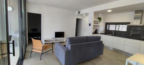 TV a/nebo společenská místnost v ubytování OD'A Apartaments