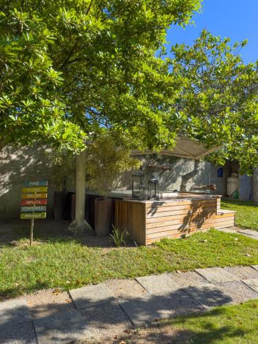 a house with a sign in front of it at Rancho Litoral Búzios in Búzios