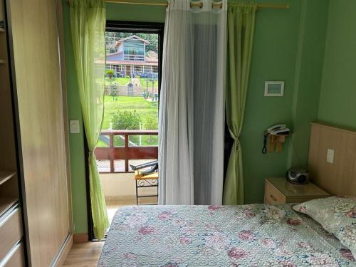 Ένα ή περισσότερα κρεβάτια σε δωμάτιο στο Piemonte Flat 104 B