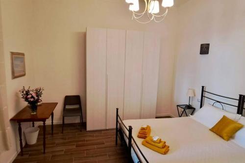 Krevet ili kreveti u jedinici u okviru objekta Le case di Cate e Max - Sole