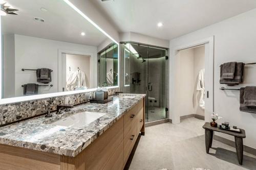 a bathroom with a large sink and a shower at Beaver Creek Lodge 511 in Beaver Creek