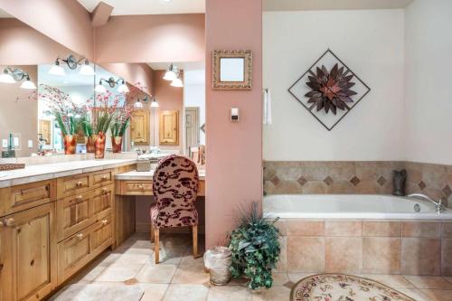 a bathroom with a tub and a sink at Arrowhead Drive 179-W in Edwards