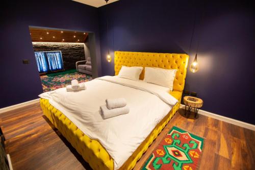Hotel La Montagna tesisinde bir odada yatak veya yataklar