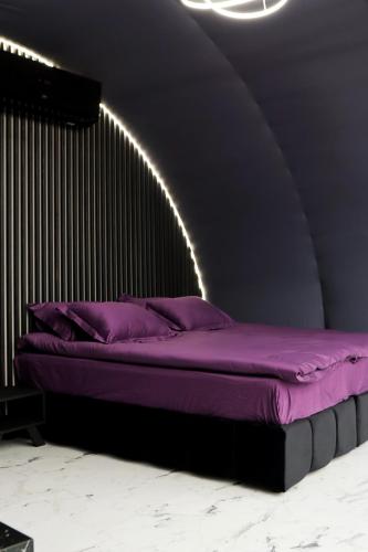 Cama o camas de una habitación en Wellland Hotel