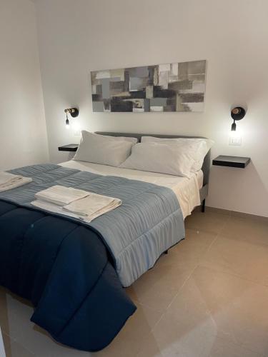 Ένα ή περισσότερα κρεβάτια σε δωμάτιο στο Portobello Apartment
