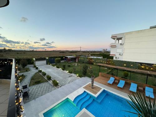 an overhead view of a swimming pool on a building at Villa Shefit in Rrushkull