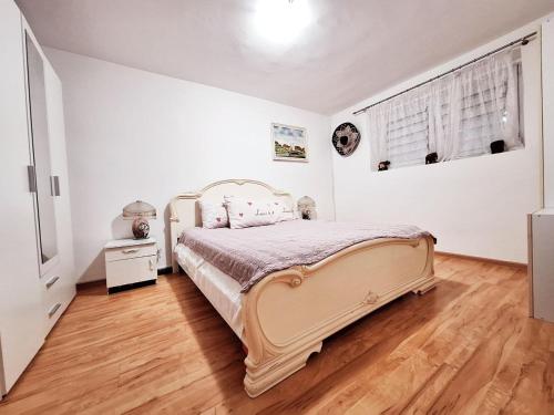 Ένα ή περισσότερα κρεβάτια σε δωμάτιο στο Melody apartment