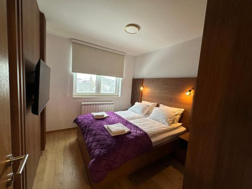 Postel nebo postele na pokoji v ubytování Apartman Srna 303 Jahorina