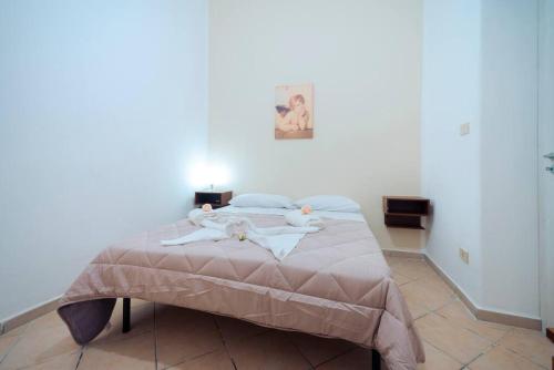 Кровать или кровати в номере Central Station Apartment - Sbrijù