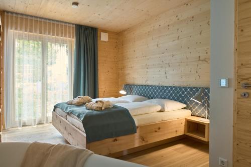 Llit o llits en una habitació de Naturferienwohnung Weitsicht
