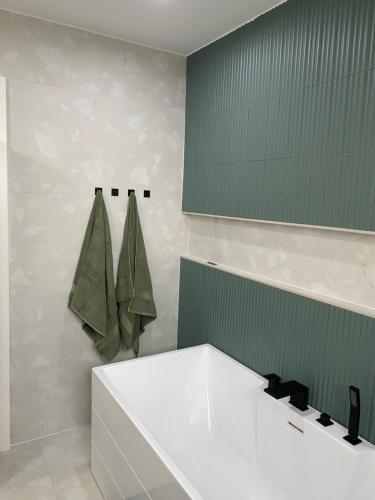 Ένα μπάνιο στο Maison spacieuse au calme proche Colmar avec piscine