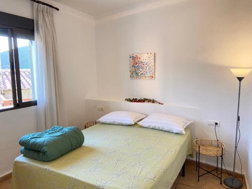 Postelja oz. postelje v sobi nastanitve Piso en Vall de Almonacid con vistas, aire acondicionado, Wifi y Smart TV