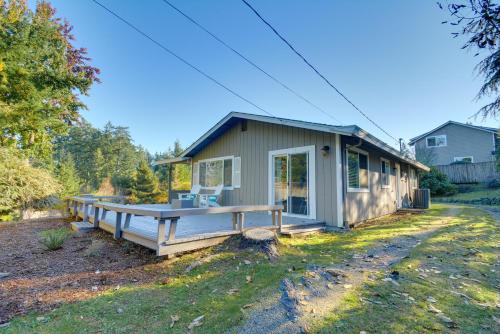 a tiny house with a large porch at Gig Harbor Vacation Rental Home 1 Mi to Uptown! in Gig Harbor