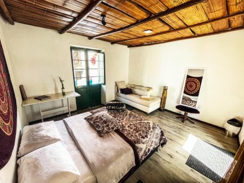 Postel nebo postele na pokoji v ubytování El Yarumo Hostel