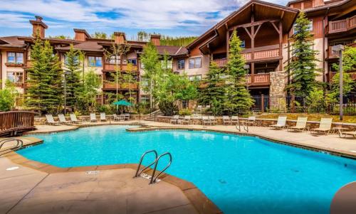 an image of a swimming pool at a resort at Stunning at Solitude, Steps from Chair Lift, East #103 in Brighton