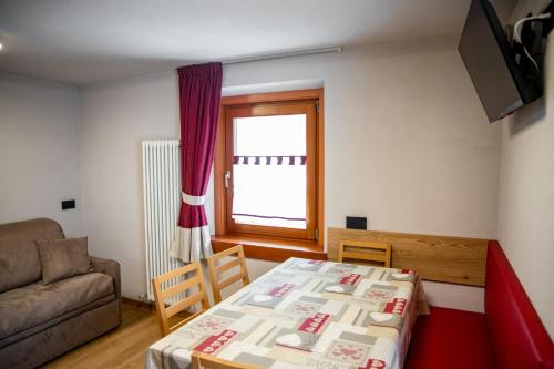 Een bed of bedden in een kamer bij Appartamento Guido Pina