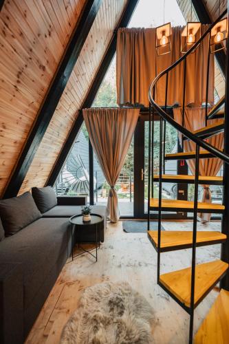 Posezení v ubytování Campulung Chalets