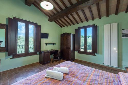 Agriturismo I Getsemaniにあるベッド