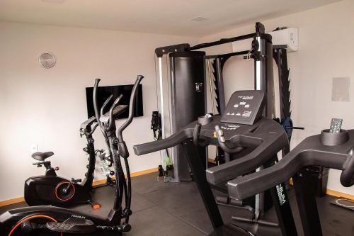 a room with a gym with a treadmill and a bike at Salvador / Perto do Shopping Salvador e Shopping da Bahia / Caminho das Árvores in Salvador