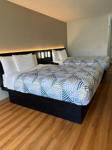 Postel nebo postele na pokoji v ubytování Motel 6-Seaside, OR