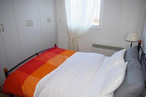 Postel nebo postele na pokoji v ubytování Shepherd's Cottage Koumaritsi