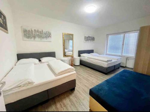 Ein Bett oder Betten in einem Zimmer der Unterkunft Appartment salzburg city center