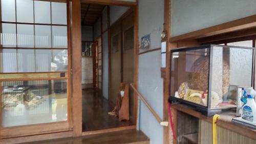 Cuisine ou kitchenette dans l'établissement 民泊M103