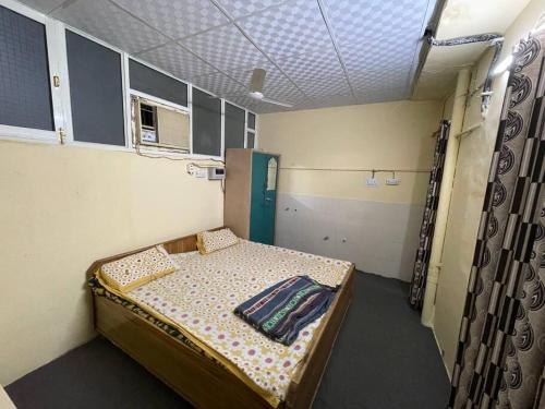 Säng eller sängar i ett rum på Kohli-guest house