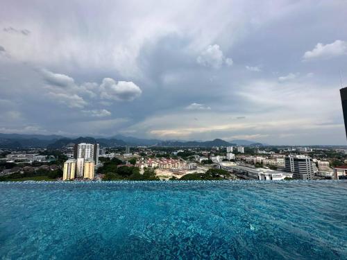 a view of a city from a swimming pool at The Horizon by Mykey Global in Ipoh