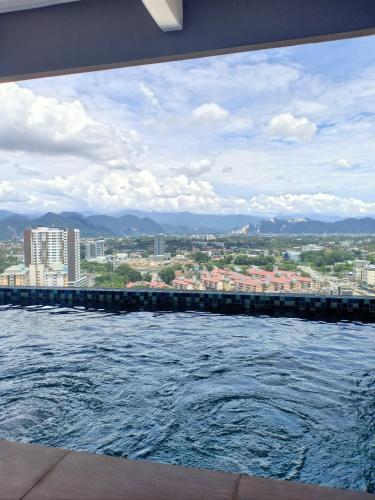 a view of a river with a city in the background at The Horizon by MyKey in Ipoh