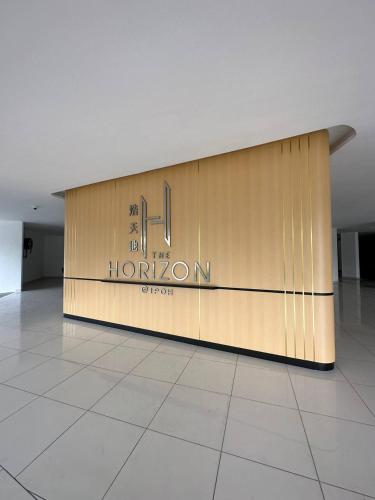 a wall in a building with a sign on it at The Horizon by MyKey in Ipoh
