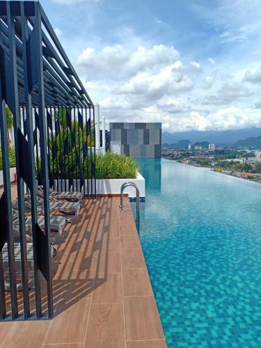 a swimming pool on the roof of a building at The Horizon by MyKey in Ipoh