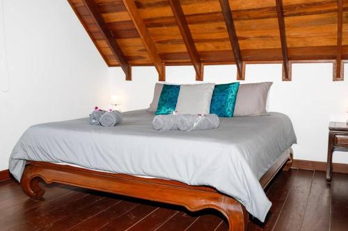 מיטה או מיטות בחדר ב-Baan Chom Chan