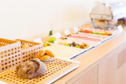 a bakery with a loaf of bread on a counter at mk hotel remscheid in Remscheid