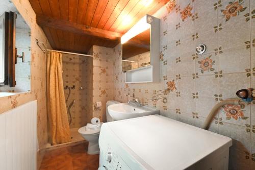 Koupelna v ubytování Chalet Rustico Al Platano