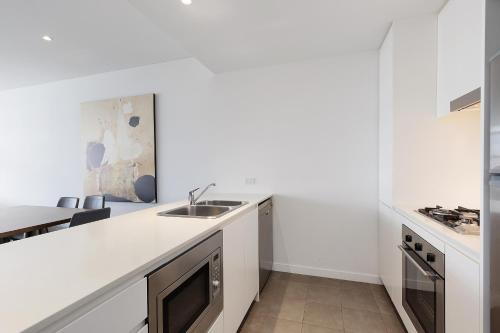 Kuchyň nebo kuchyňský kout v ubytování Premium Apartments Chatswood