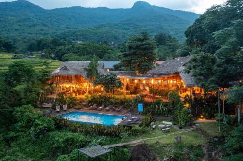 an aerial view of a resort with a swimming pool at Puluong Valley Home in Pu Luong