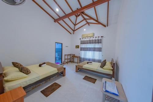 Postel nebo postele na pokoji v ubytování Ciel Grand Villa