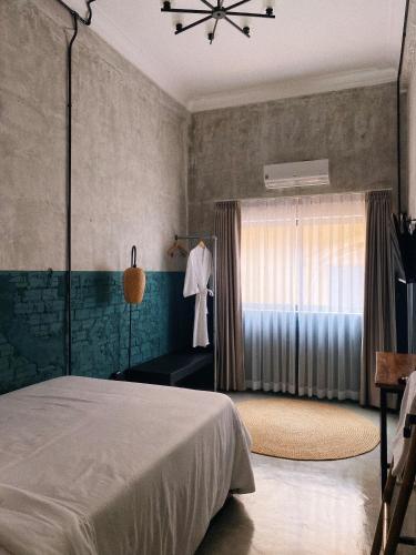 Sundays Boutique Eco Hotelにあるベッド