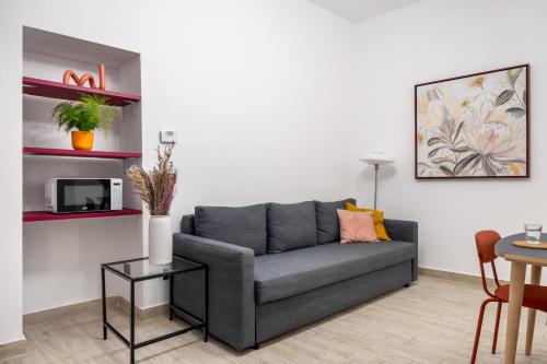 Open Sicily Residence - Central Apartments Near Quattro Cantiにあるシーティングエリア