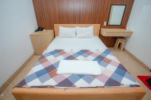 KHÁNH GIA HOTELにあるベッド