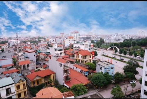 an overhead view of a city with buildings at Hương Sen Hotel Bac Giang in Bắc Giang