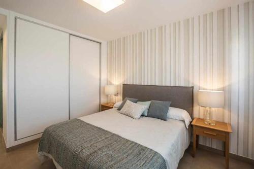 Postel nebo postele na pokoji v ubytování Apartamento Capri IV Vistabella golf
